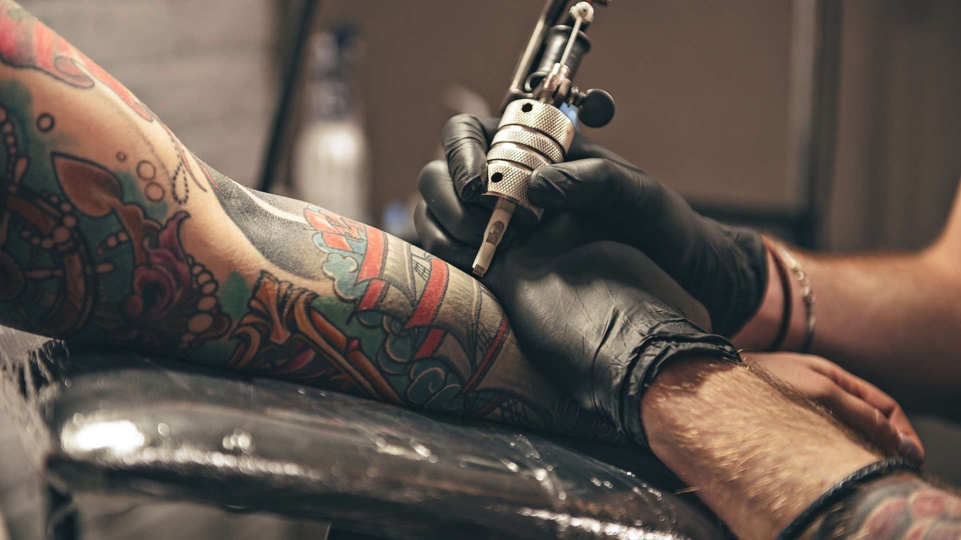 Tattoo artist at work